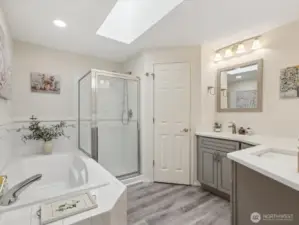 Sumptuous 5-pc Bath with soaking Tub & separate Shower, dual vanity & lovely floors.