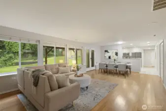 Virtually-Staged great room, open to the kitchen