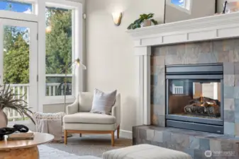 Dual fireplace warming the living room and office