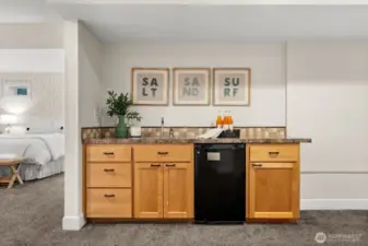 Additional wet bar downstairs for the ultimate rec room entertainment
