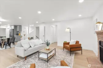 Second living area with new gas fireplace. Throughout the home, enjoy fresh paint, solid wood shaker doors with craftsman casing and trim, and brand-new luxury vinyl plank floors.