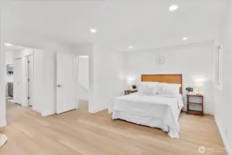 Luxurious and tranquil main suite with bay window bench, walk-in-closet and spa-like bathroom. Luxury vinyl plank flooring, fresh paint, solid wood, single-panel white shaker doors with full wood craftsman bungalow casing trim, and adjustable canless lighting.