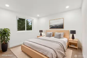 Bedroom 4. Luxury vinyl plank flooring, fresh paint, solid wood, single-panel white shaker doors with full wood craftsman bungalow casing craftsman trim, and adjustable canless lighting throughout the home.