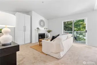 High vaulted ceilings open up the living space to feel spacious and roomy. Slider access off the living room onto your private balcony for year-round outdoor enjoyment.
