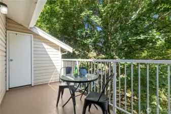 Enjoy your morning cup of coffee or al fresco dining out on the balcony with a peaceful backdrop. Additional storage unit on balcony.