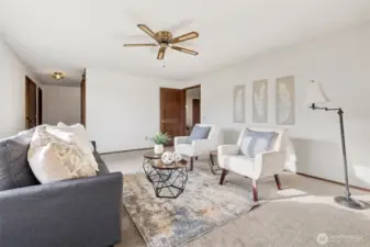 Looking from the fireplace you have a better idea of the entry, and the door at the top here goes into the kitchen and dining room.