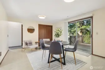 Here's the dining room and this overall room is so big you could even have another living area in here. You'll see the possibilities on the next photo. That closet in the back of this photo measures easily 6 feet wide by 4 feet deep - storage galore!