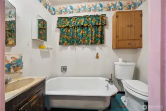 Hall bathroom with classic styling awaiting your design vision.