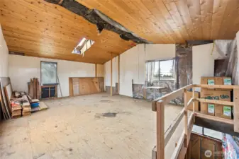 Bonus loft addition with vaulted ceilings, great light, and room to reimagine.