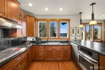 Soapstone counters, Wolf range, Meile dishwasher