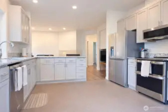 The kitchen opens into the family room.