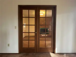 French door entrance to den/office space
