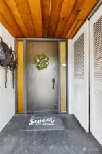 Enter into the Mud Room w/tongue and groove cedar ceiling. Hang your coat and backpack, leave your shoes and enter into the home. Convenient Keypad Entry. Louvered Doors lead to 2-Car Garage.