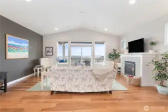 Living room with vaulted ceilings.