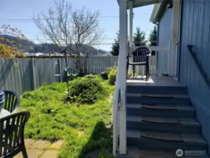 Side Yard by Back Entry Door off the Carport.