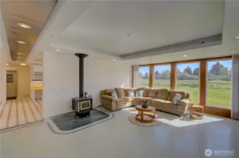 Main floor living room looking into the kitchen