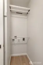 Connections installed for stackable washer-dryer appliance if desired in Primary Closet. Common laundry facilities available in building as option.
