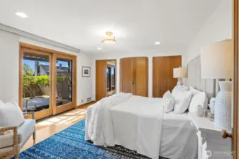 Primary Bedroom w/ easy access to private Hot Tub