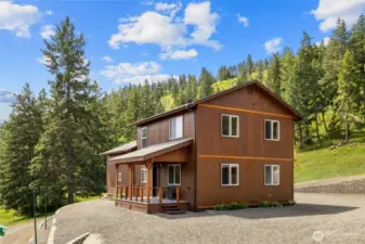 The 2 bedroom bunk house with attached garage is a fantastic addition to this property, offering guest or rental space.