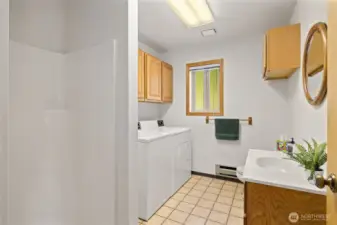 Bathroom with laundry facilities in the bunk house.