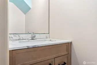 Main level powder room.