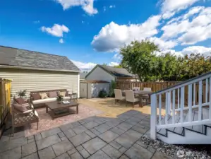 Patio furniture virtually staged. 1 car detached garage
