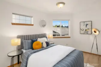 Bright and cozy guest bedroom.