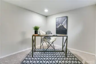Downstairs you will find this added flex space, guest room, playroom, office or craft room. There is also a sunny window that allows the sun to shine through!