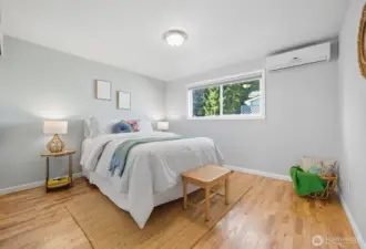 Large bedroom with air conditioning.