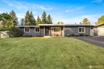 Large front and fenced backyards.