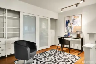 Dedicated Office Space off Family Room with California Closets