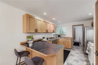 Pocket door to the spacious laundry room