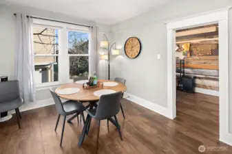 Unit #2015: The dining spacious dining room accommodates a much larger table for entertaining, and is just a few feet from plenty of prep space in the kitchen beyond.