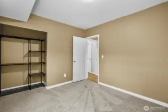 Another angle of downstairs 4th bedroom. Newer carpet.