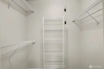 Primary bedroom walk-in closet.