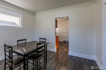 Unit A Dining area with entry into kitchen - so many possibilities!