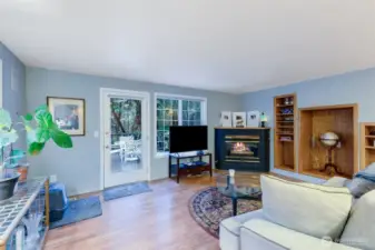 Living room with Fireplace and back deck door