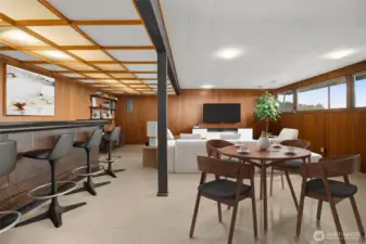 Family room with bar and fireplace (virtually staged)