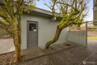 Entryway to the detached garage and to the back patio