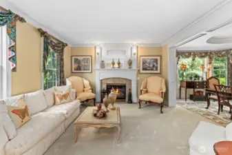 Formal living room with one of four well appointed gas fireplaces.