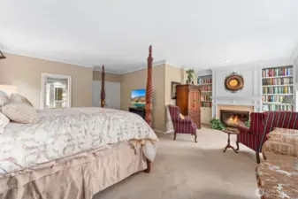 Sitting area in the master suite complete with cozy gas fireplace #4! Imagine sipping your favorite beverage in the morning or evening from this lovely room.