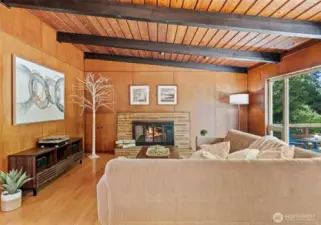 A wall of large windows allows fills the living and dining rooms with sparkling light.
