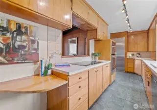 Another view of the kitchen. Built-in oven and microwave/convection oven .