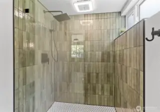 New step-in oversized shower in the primary bath.
