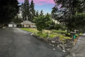 Twilight picture of the yard and house