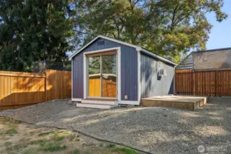 She/He shed!  Perfect for private gym or even home office.   Has wall air conditioner.