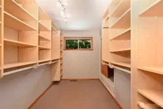 Walk in closet with window.