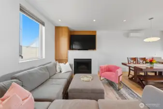 Great built-ins around charming fireplace.