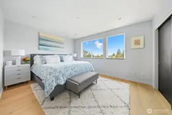 Primary bedroom with views of Olympic Mountains