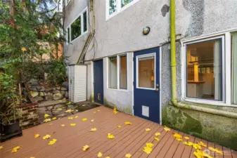 Deck features two garden planters, ideal for urban gardening.